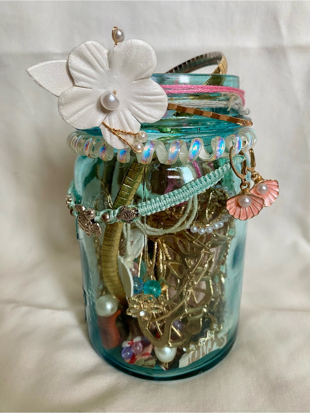 Aqua Glass Jar Filled with Assorted Costume Jewelry